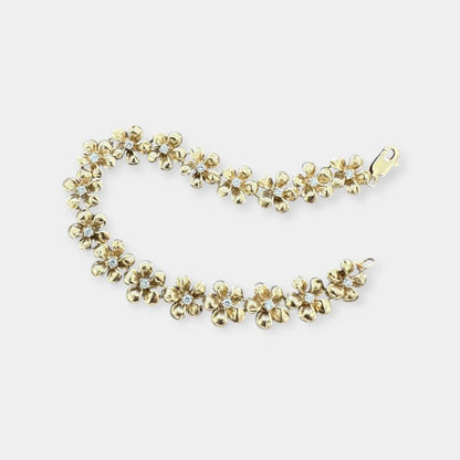 Armbånd med blomster i 14 karat guld og zirkoner