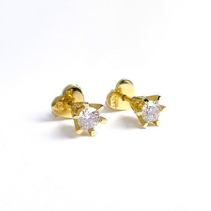 Ørestikkere i 18 karat guld med 2x0,22ct. brillanter