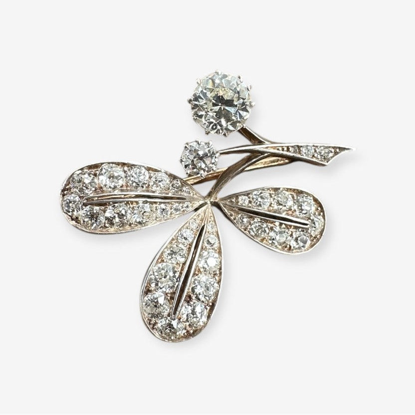 Broche med diamanter i 18 karat guld og hvidguld